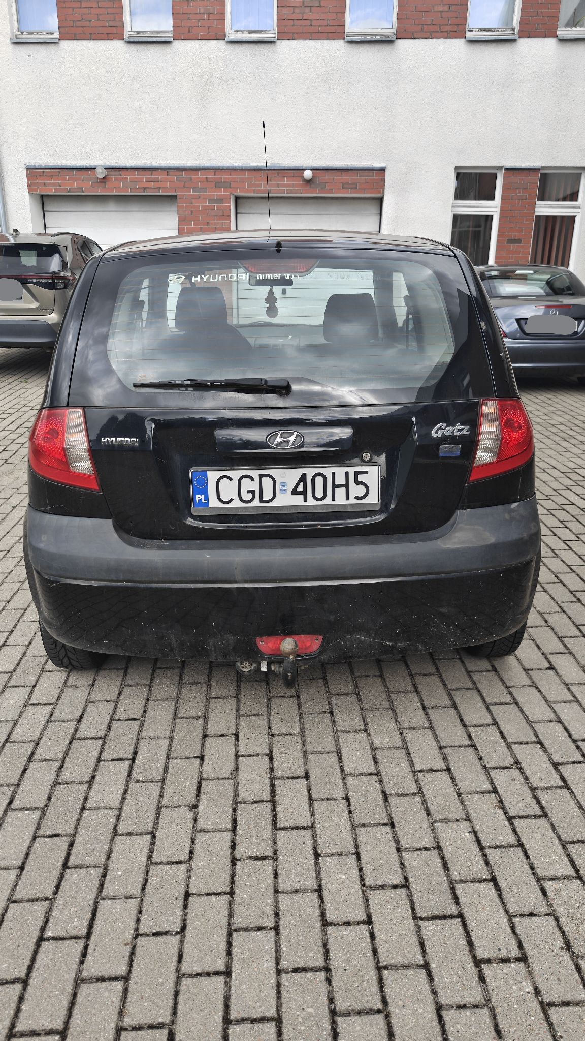 Zdjęcie przedstawia tył auta.