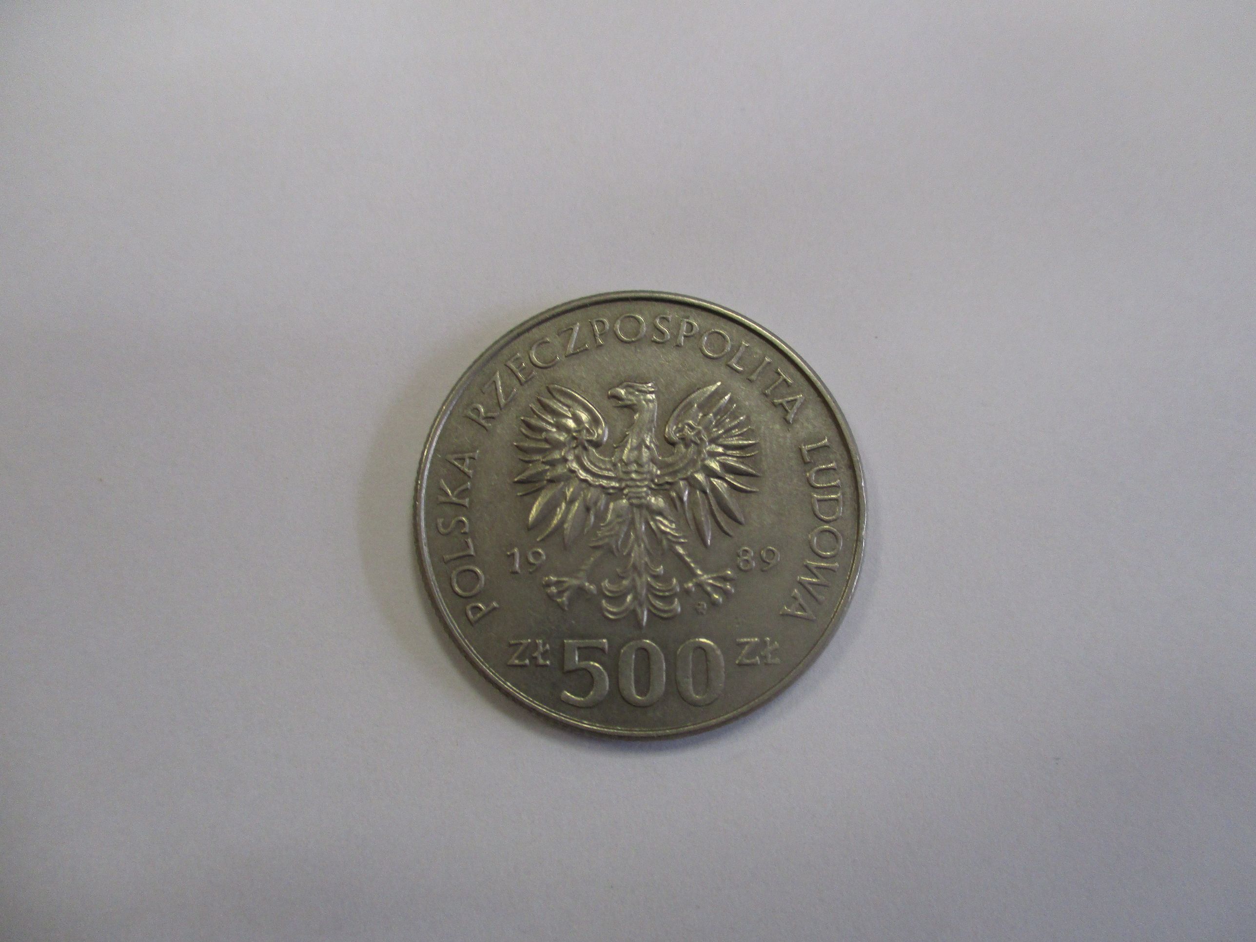 Moneta 500 zł z 1989, (awers): godło PRL - orzeł bez korony, napis Polska Rzeczpospolita Ludowa oraz nominał ZŁ 500