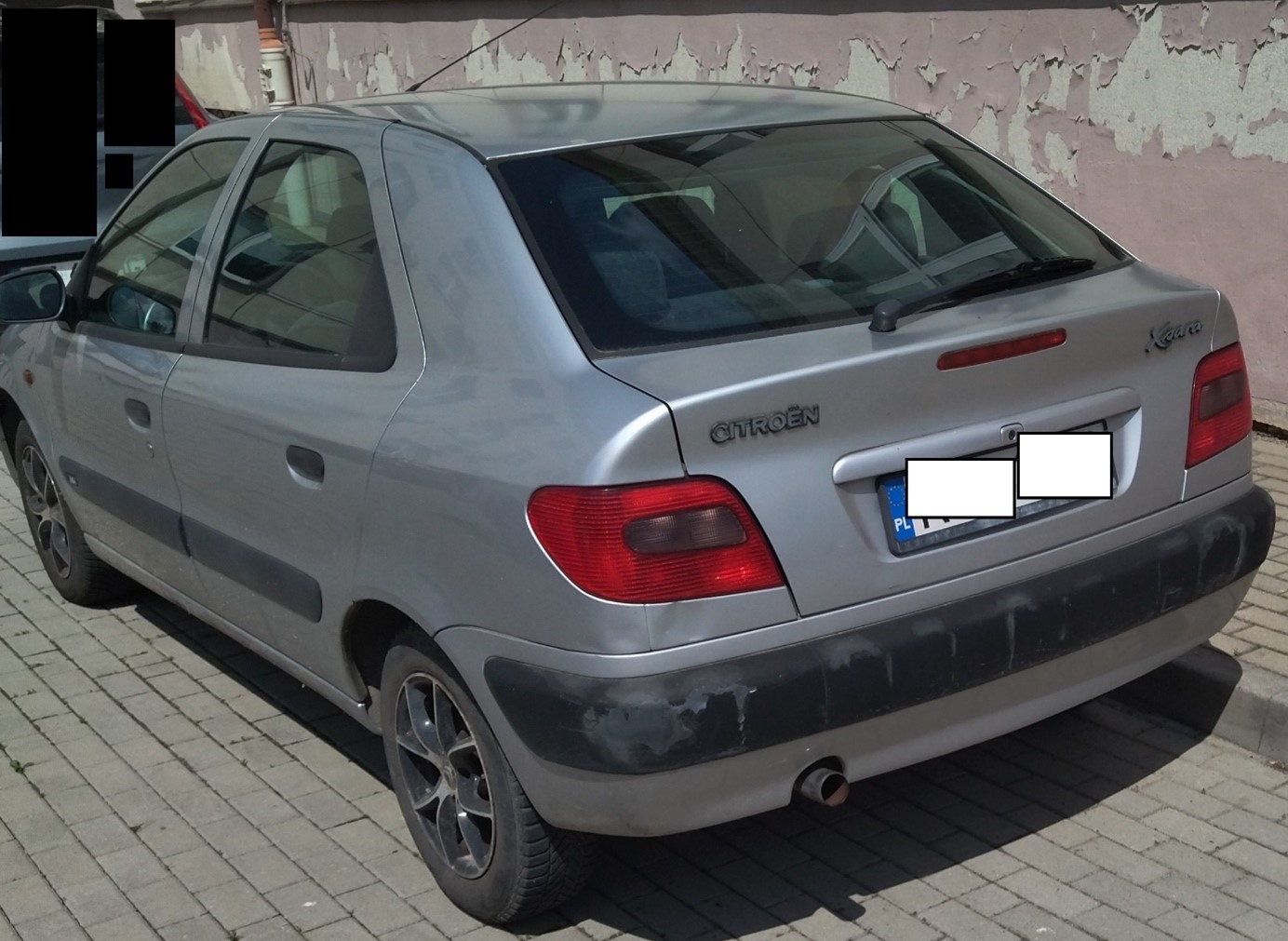 Samochód osobowy Citroen Xsara ,srebrny ,widok z tyłu