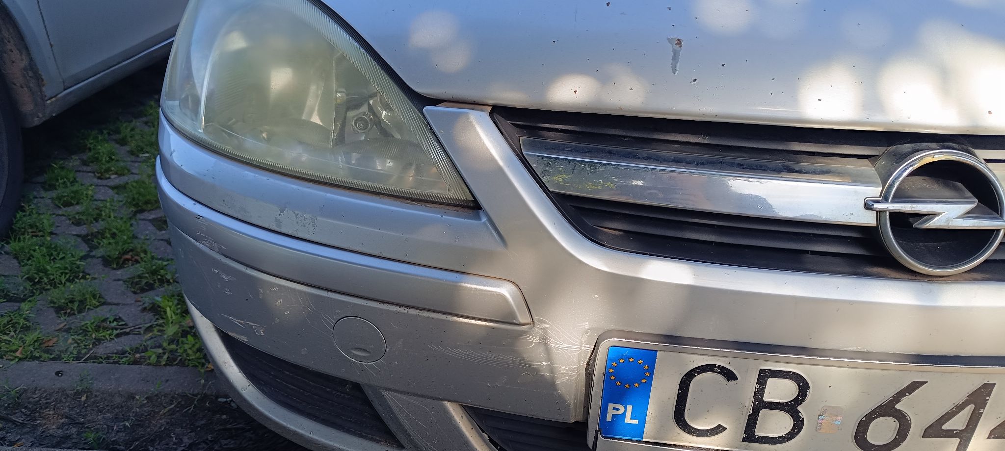 Zderzak prawy przedni i reflektor
