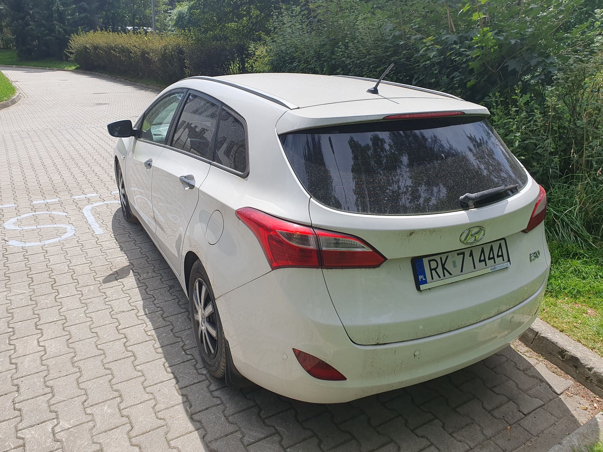 Hyundai i30 kombi, biały, lewy tył