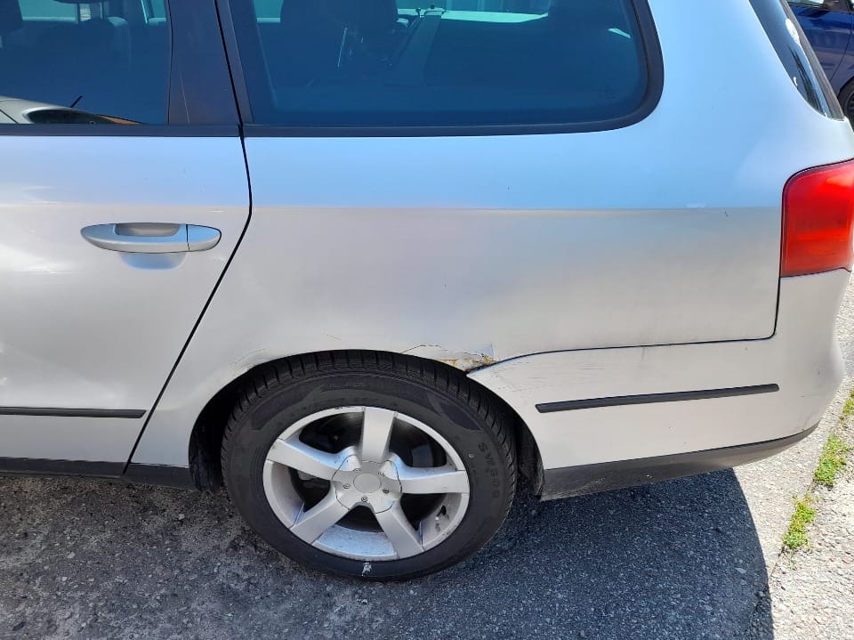 Volkswagen Passat - uszkodzenia lewe tylne nadkole