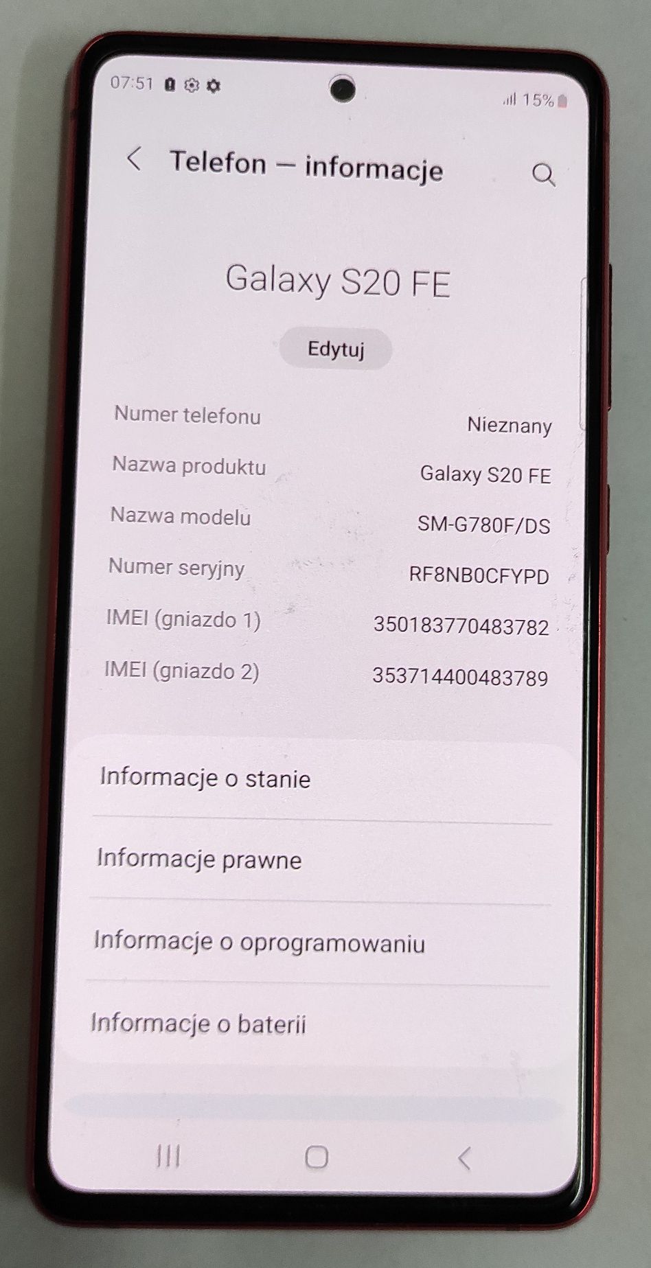 Włączony ekran telefonu Samsung S20 FE, widoczna strona z numerem IMEI