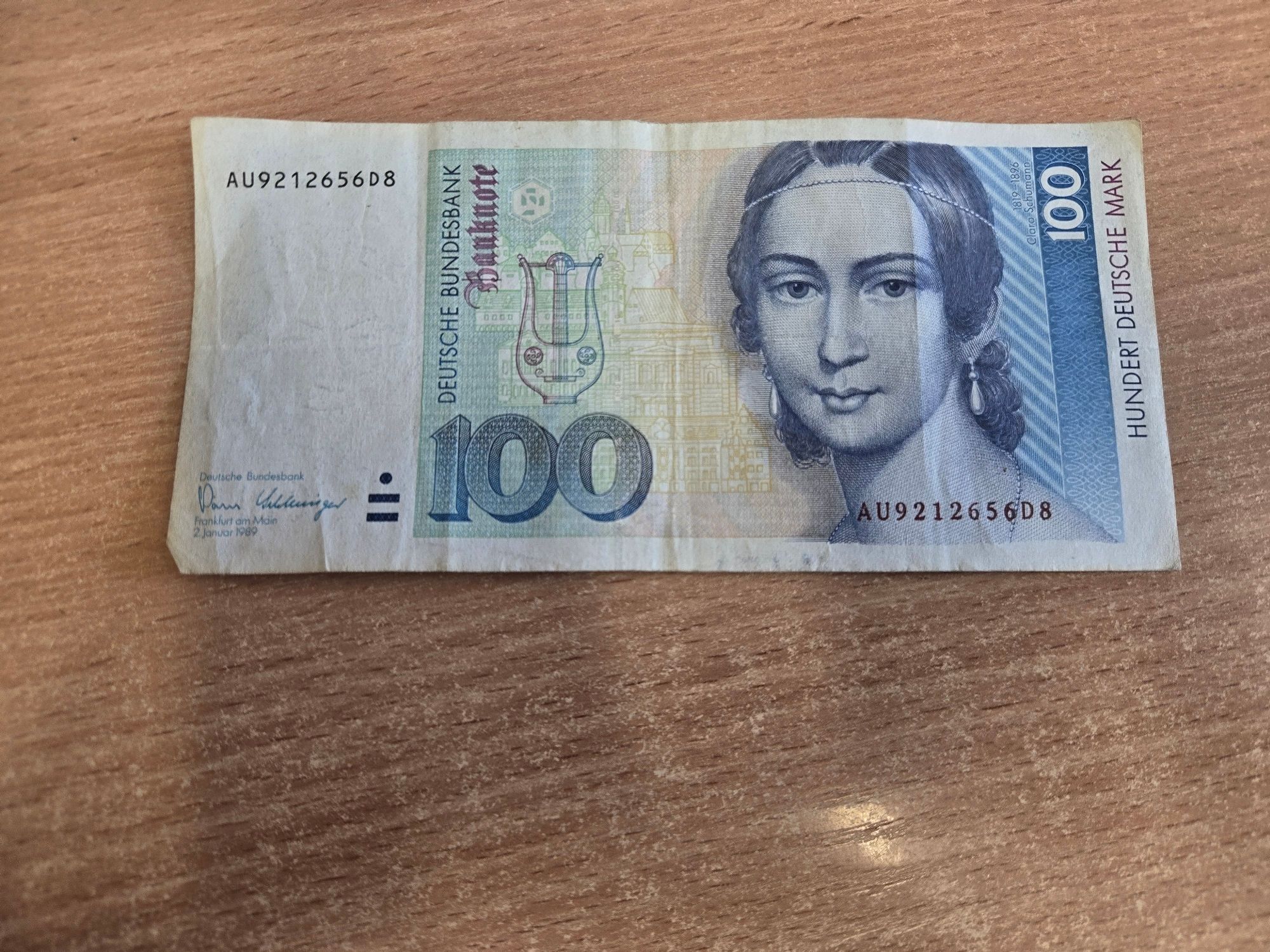 Zdjęcie przedmiotu. Przedstawia banknot o nominale 100 marek niemieckich.
