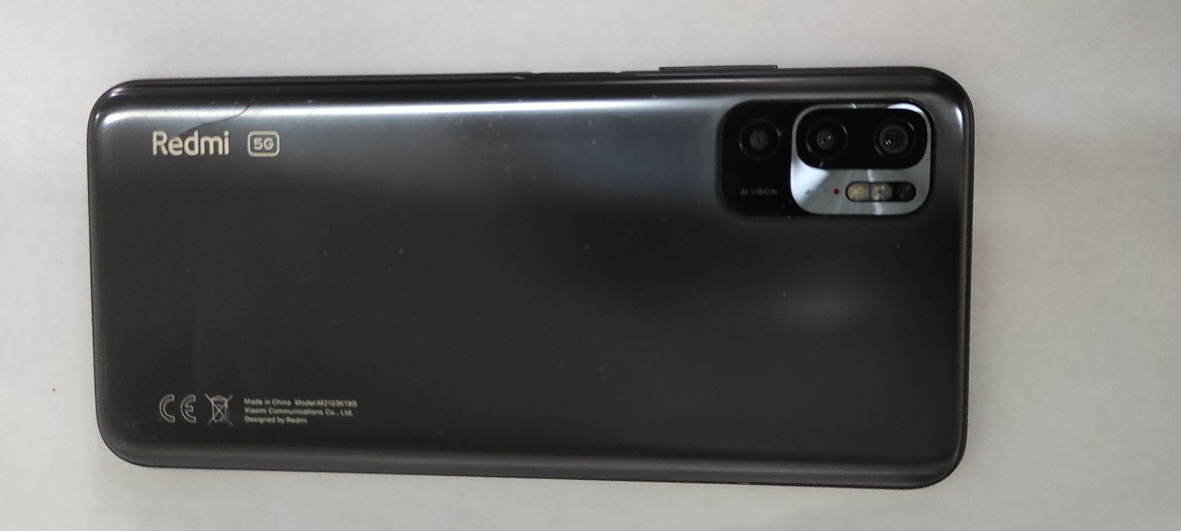 Tylna obudowa telefonu REDMI Note 10 5g koloru czarnego.